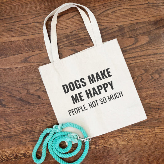 Tote bag that says "DOGS MAKE ME HAPPY PEOPLE, NOT SO MUCH"