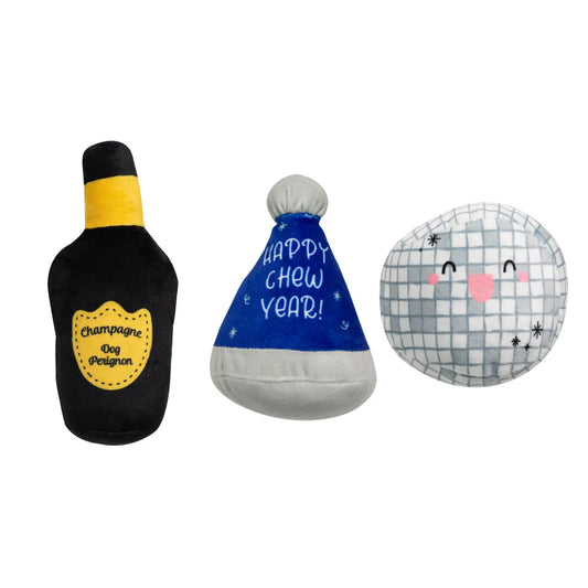 Happy Chew Year dog toy set 3-pack incuding a champagne bottle, a happy chew year party hat and a smiling disco ball