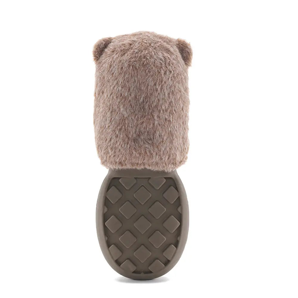 backside of the beaver dog toy showcasing fur and a hard plastic waffle-pattern beaver tail