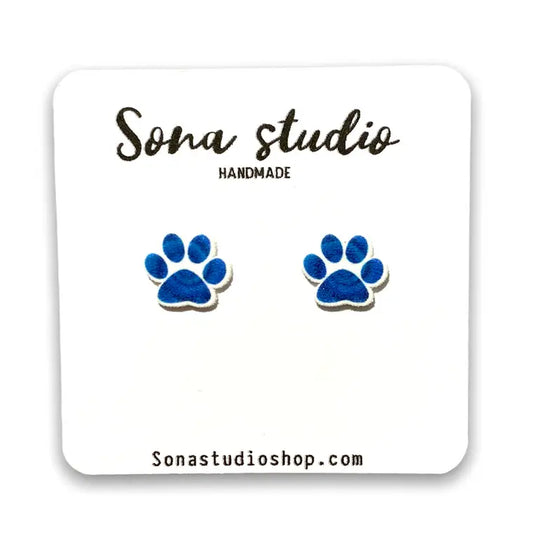 isolated Sona Studio blue spiral paw print earrings