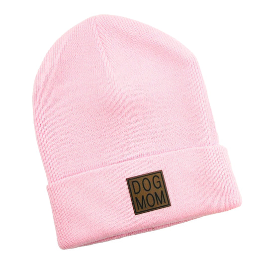 light pink beanie hat with a leather patch that says dog mom