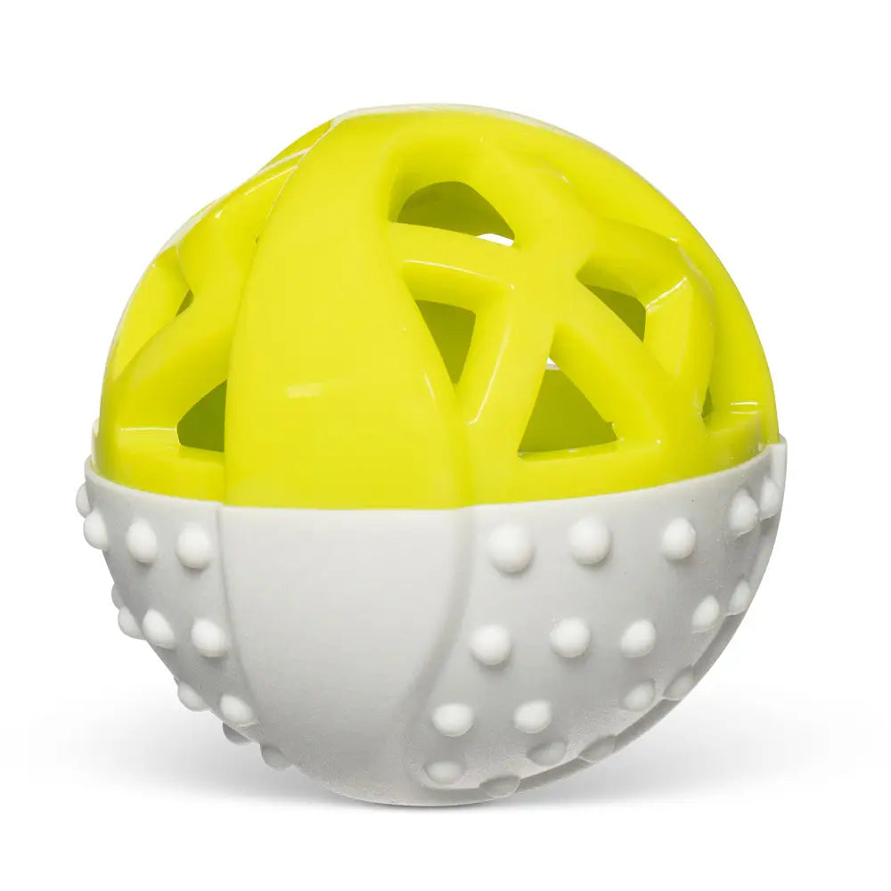 Isolated Catch 'n Squeak Ball Dog Toy. The top half of the toy is a neon green and has triangular holes. The bottom half of the toy is white and has little round bumps.