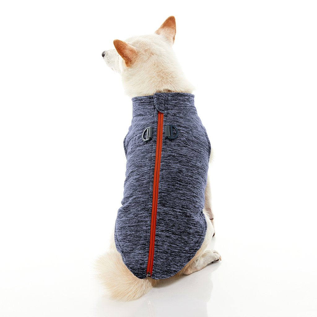 medium sized dog modeling the zip up vest