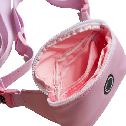 pink fanny pack with multiple pockets on the inside