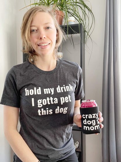 hold my drink I gotta pet this dog screen printed in white ink on a dark grey heather tee