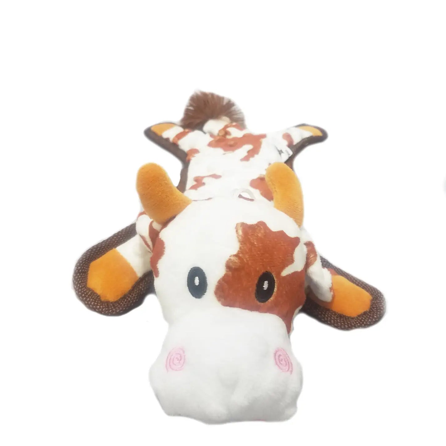 brown and white cow dog toy